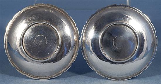 A pair of 1930s Arts & Crafts silver crenelated dishes, by Omar Ramsden, Diameter 4 ½”/114mm Combined weight 6.8oz/194grm